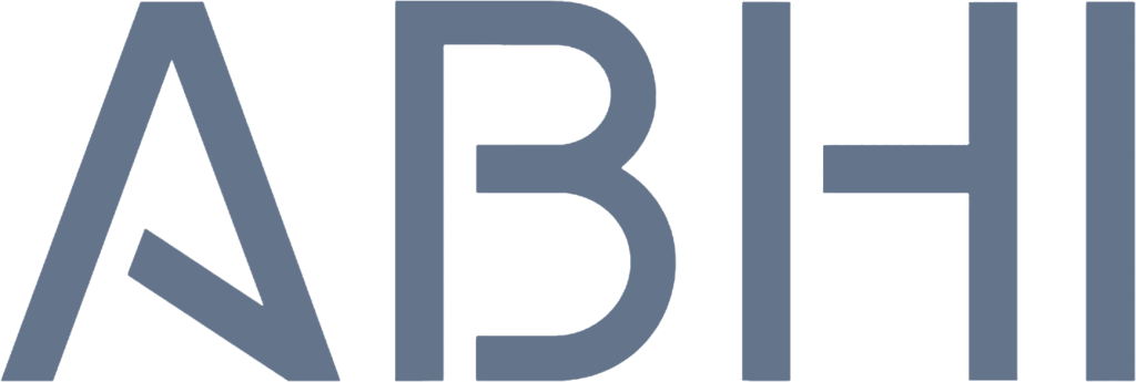 The logo for ABHI (Association of British HealthTech Industries) features the acronym in a clean, minimalist, all-caps sans-serif typeface. The letters are rendered in a professional slate-blue color. The design is notable for its geometric styling, particularly the "A," which lacks a traditional horizontal crossbar, and the "B," which is formed with distinct, open curves. This modern aesthetic reflects a forward-thinking and technical industry focus.